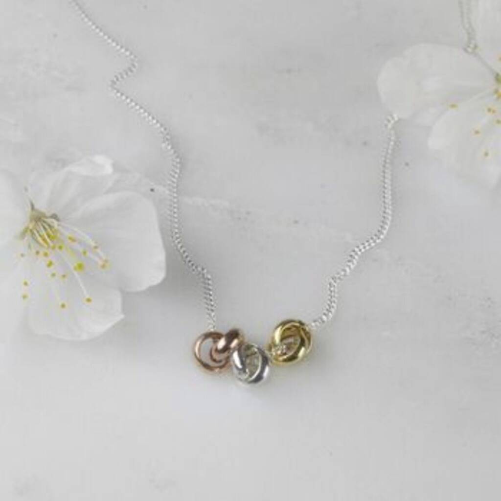 Three Knot Necklace In Silver, Rose And Gold, 1 of 6