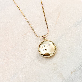Celestial Moon And Starburst Reversible Locket Necklace, 2 of 3