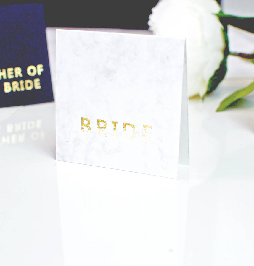 marble and gold foil wedding place name cards by made with