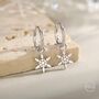 Sterling Silver Dainty Snowflake Huggie Hoop, thumbnail 1 of 10