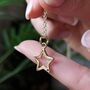 9ct Gold Open Star Necklace With Ruby, thumbnail 1 of 6