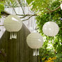 Set Of Three Cream Tassel Solar Lanterns, thumbnail 1 of 2