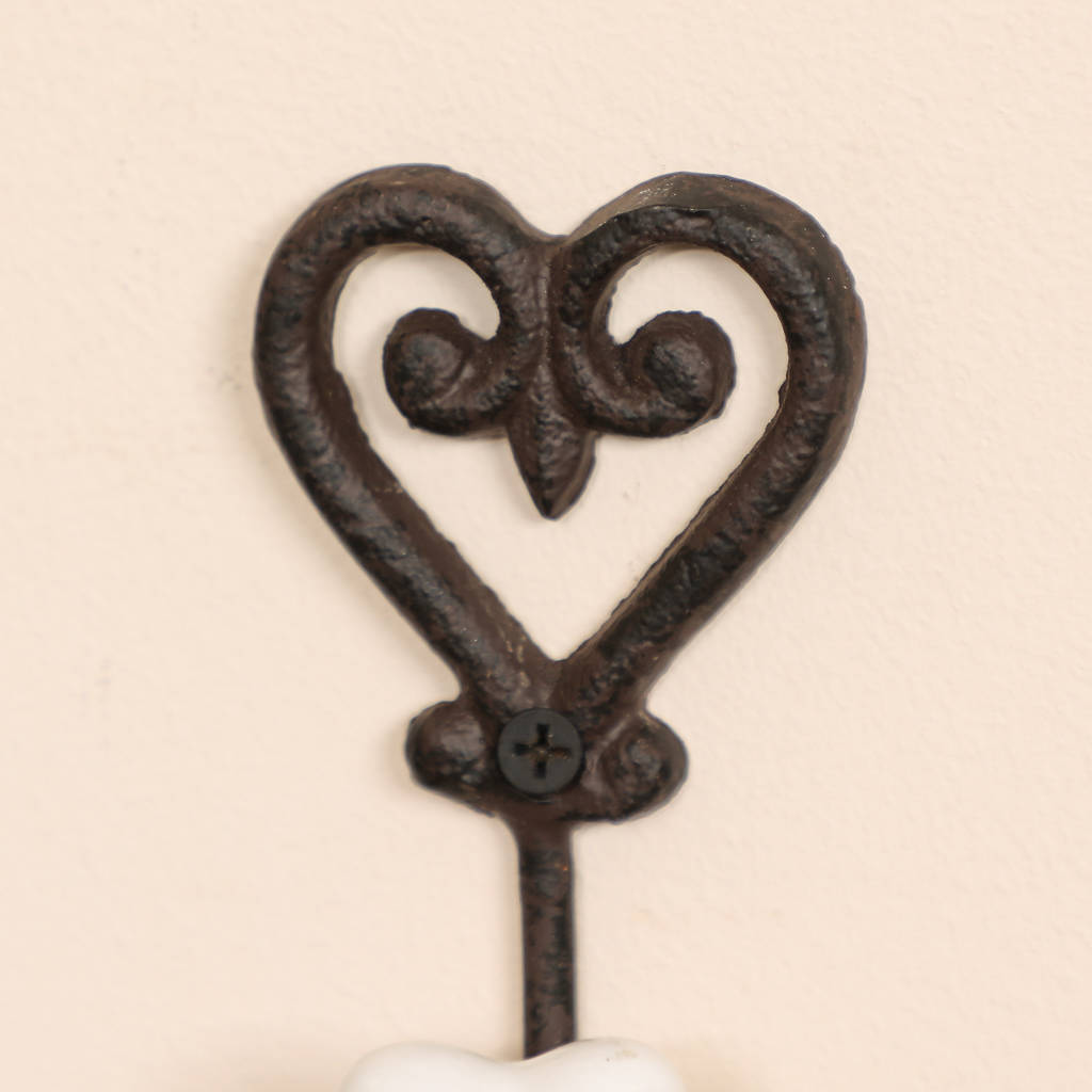 set of four cast iron heart hooks by dibor