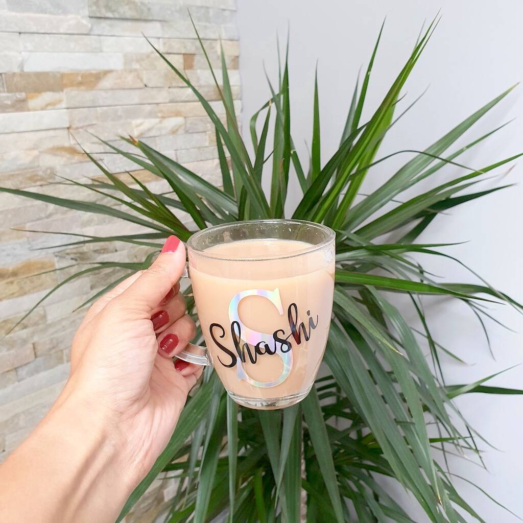 https://cdn.notonthehighstreet.com/fs/e9/57/5c8e-a664-4998-a4e1-5cf798215ae4/original_personalised-initial-glass-mug.jpg