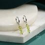 Sterling Silver Genuine Peridot Trio Huggie Hoop Earrings, thumbnail 1 of 10