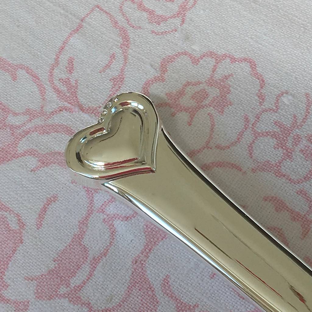 silver plated wedding  cake  knife  by chapel cards  