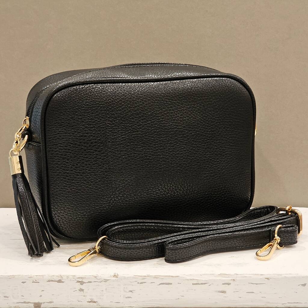 Single Zip Cross Body Bag With Tassel In Black By Nest