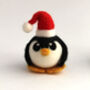 Penguin Christmas Decoration Penguin In Santa Hat, thumbnail 3 of 6