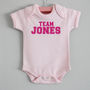 'Team Surname' Personalised Baby Grow, thumbnail 3 of 5
