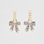 Gold Forget Me Not Bow Huggie Earrings, thumbnail 1 of 9