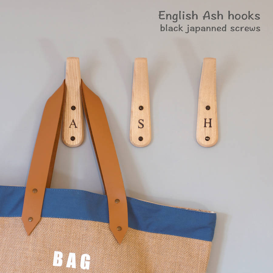 personalised wooden coat hooks with branded letters by layertree