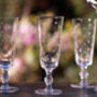 Set Of Four Champagne Flutes With Stars Design, thumbnail 1 of 2