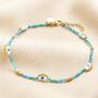 Evil Eye Blue And Green Seed Bead Anklet In Gold, thumbnail 1 of 2