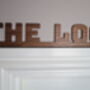 The Loo Sign: Walnut Wood Door Topper With Adhesive Dots, thumbnail 3 of 7