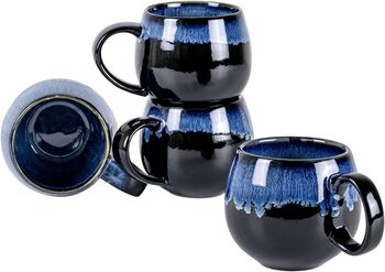 Set Of Four Reactive Glaze Mugs In Inky Black And Blue, 3 of 4
