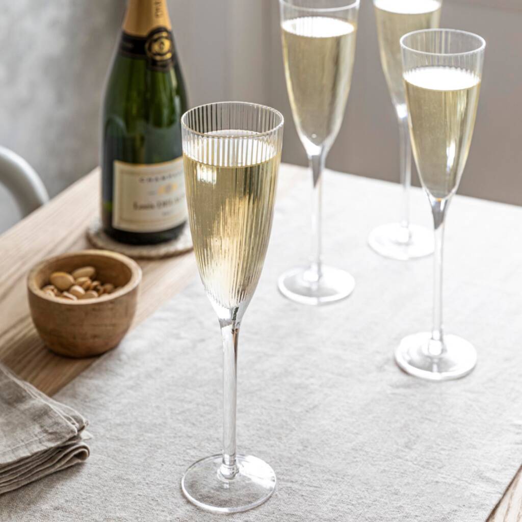 Set Of Four Fluting Champagne Glasses By Attic Room