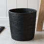 Marbury Black Round Rattan Wastepaper Bin, thumbnail 1 of 3