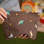 Embroidered Dinosaur Motif Cotton Make Up Bag, thumbnail 1 of 6