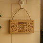 'Baking Spirits Bright' Christmas Oak Hanging Sign, thumbnail 1 of 2