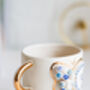 Evil Eye And Butterfly Mug With Gold Plated Handle, thumbnail 2 of 4