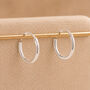 Mini Sterling Silver Huggie Sleeper Hoop Earrings, thumbnail 1 of 9