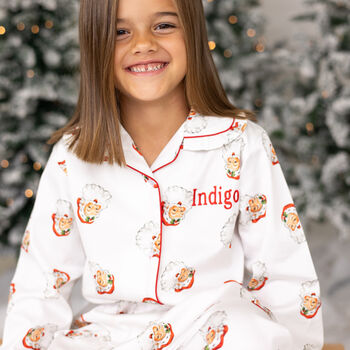 Girl's Personalised Christmas Santa Print Pyjamas, 2 of 12