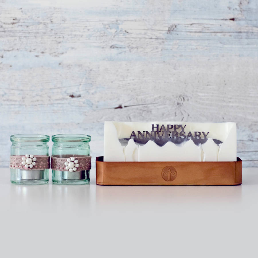 'happy anniversary' hidden message candle by melting messages