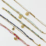 Lapis Lazuli And Gold Sunburst Charm Bracelet, thumbnail 4 of 8