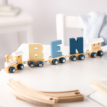 Engraved New Baby Polar Wooden Name Train, 12 of 12