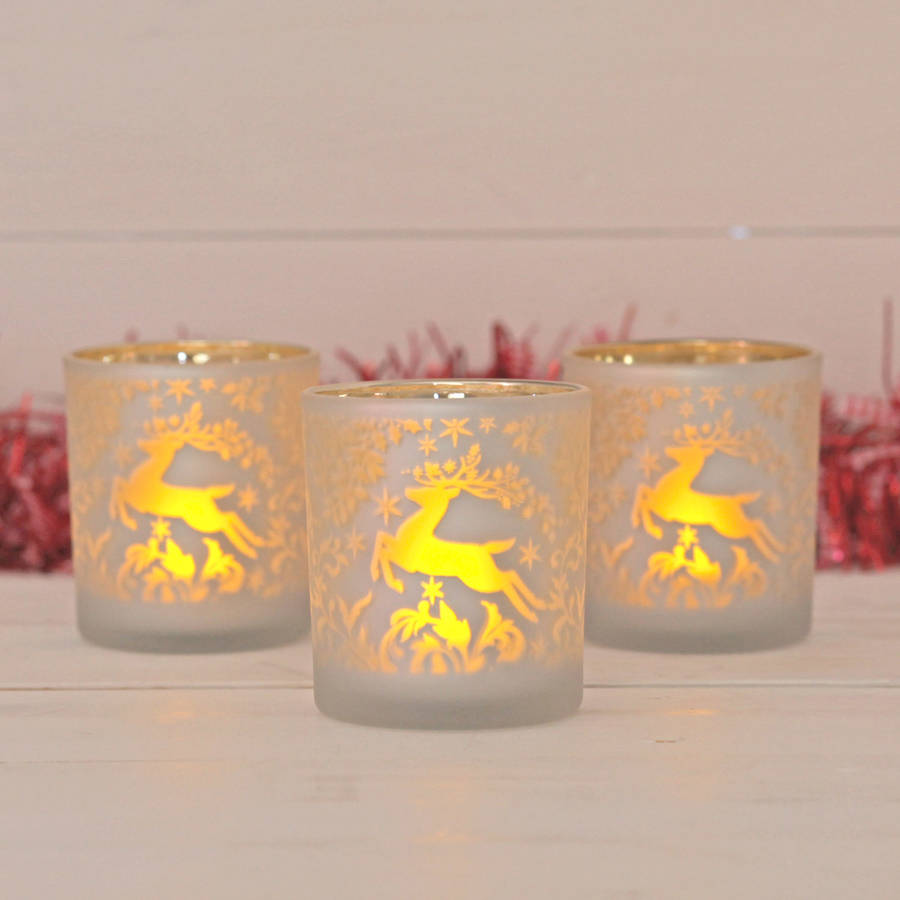 opaque reindeer tea light candle holder by red berry apple