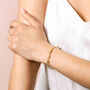 Gold Stainless Steel Twisted Bangle, thumbnail 4 of 5