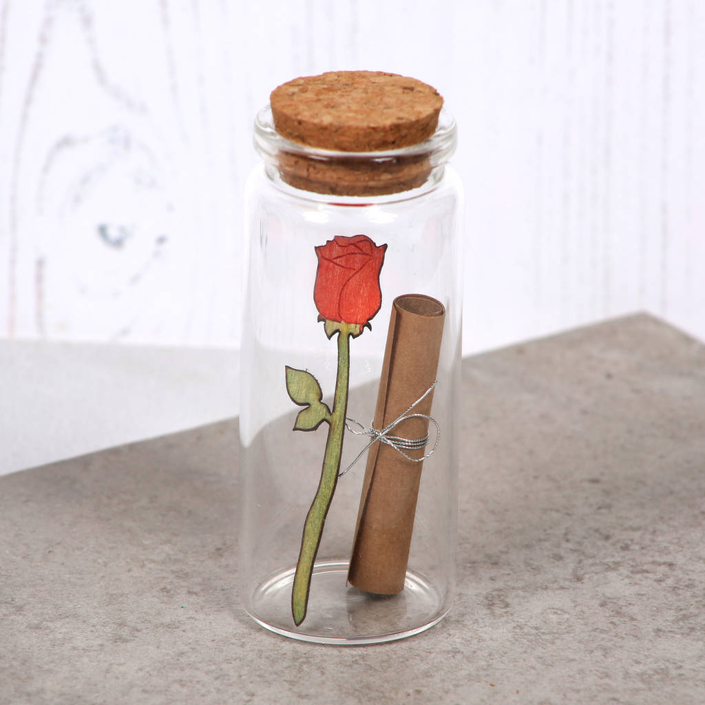 miniature rose in a bottle with personalised message by bombus