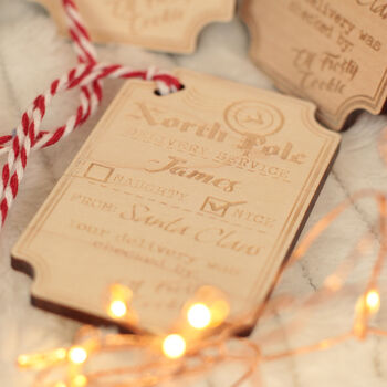 Set Of Five Reusable Santa's Nice List Wooden Gift Tags, 4 of 5