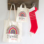 Personalised 'Believes' Northern Lights Christmas Rainbow Gift Bag, thumbnail 1 of 2