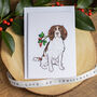 Festive Springer Spaniel Christmas Card, thumbnail 1 of 7