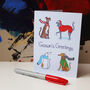 Cosy Christmas Dogs A6 Greeting Card, thumbnail 1 of 2