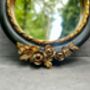 16cm Round Wall Mirror Black Frame With Gold Flower Detail, thumbnail 2 of 9