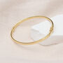 9ct Yellow Gold Oval Tube Bangle, thumbnail 1 of 3