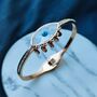 Evil Eye White Sequin 18ct Plated Gold Arm Bangle, thumbnail 5 of 5