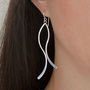Sterling Silver Dangly Curved Ribbon Earrings, thumbnail 1 of 4