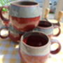 Set Of Four Reactive Glaze Sphere Mugs In Maroon And Grey Mist Haze, thumbnail 6 of 9