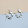 Sterling Silver Tiny Twisted Huggie Hoop Earrings, thumbnail 1 of 4