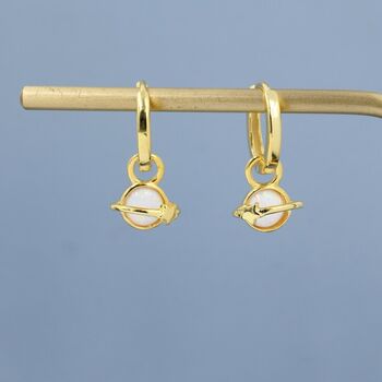 Sterling Silver White Opal Planet And Star Huggie Hoop Earrings, 2 of 11