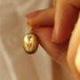 Tiny Thistle Oval Personalised Locket Necklace, thumbnail 1 of 10