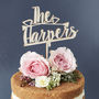 Personalised Crossed Heart Arrow Wooden Cake Topper, thumbnail 1 of 4