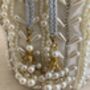 Handcrafted Ivory Pearl Potli With Pearl Wrist Chain, thumbnail 9 of 9