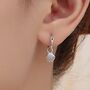 Sterling Silver Sea Shell Huggie Hoops Earrings, thumbnail 1 of 9