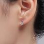 Sterling Silver Asymmetric Moon And Starburst Stud Earrings, thumbnail 4 of 12