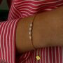 14k Gold Plated Freshwater Rice Pearl Charm Bracelet, thumbnail 3 of 6
