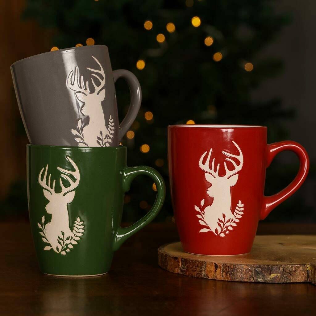 set of four reindeer christmas mugs by dibor  notonthehighstreet.com